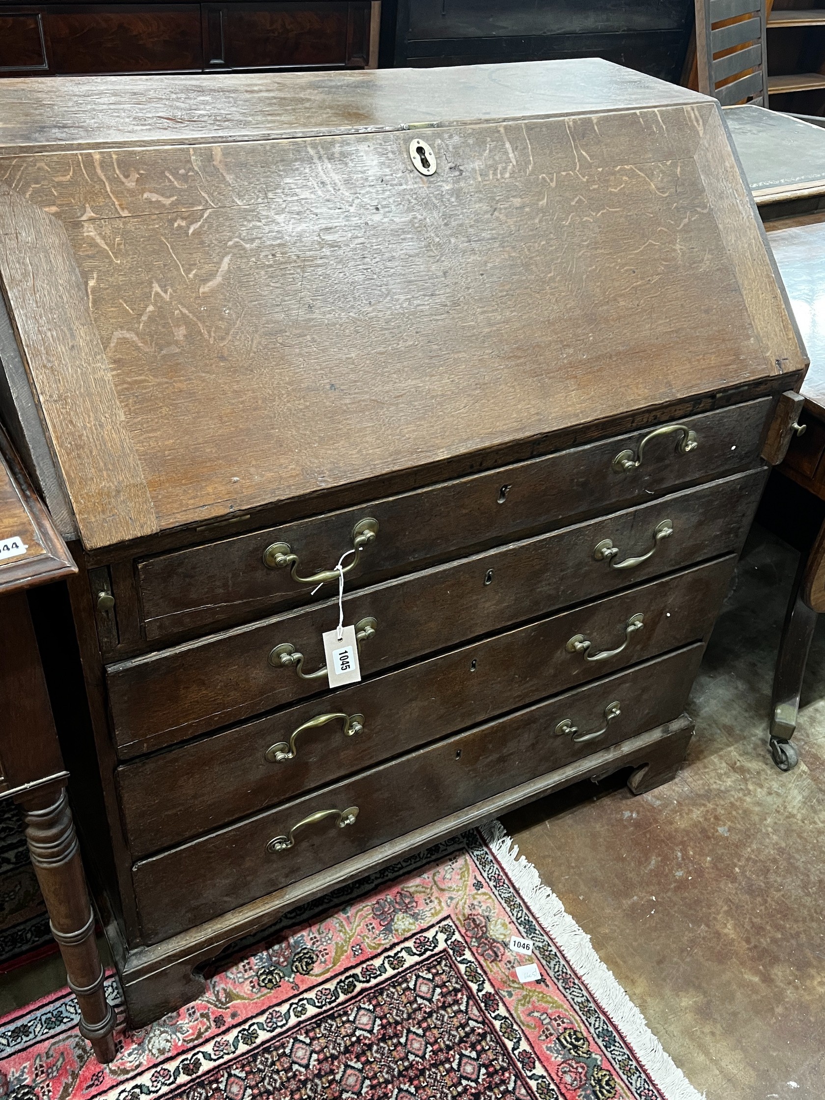 A George III oak bureau, width 91cm depth 50cm height 102cm